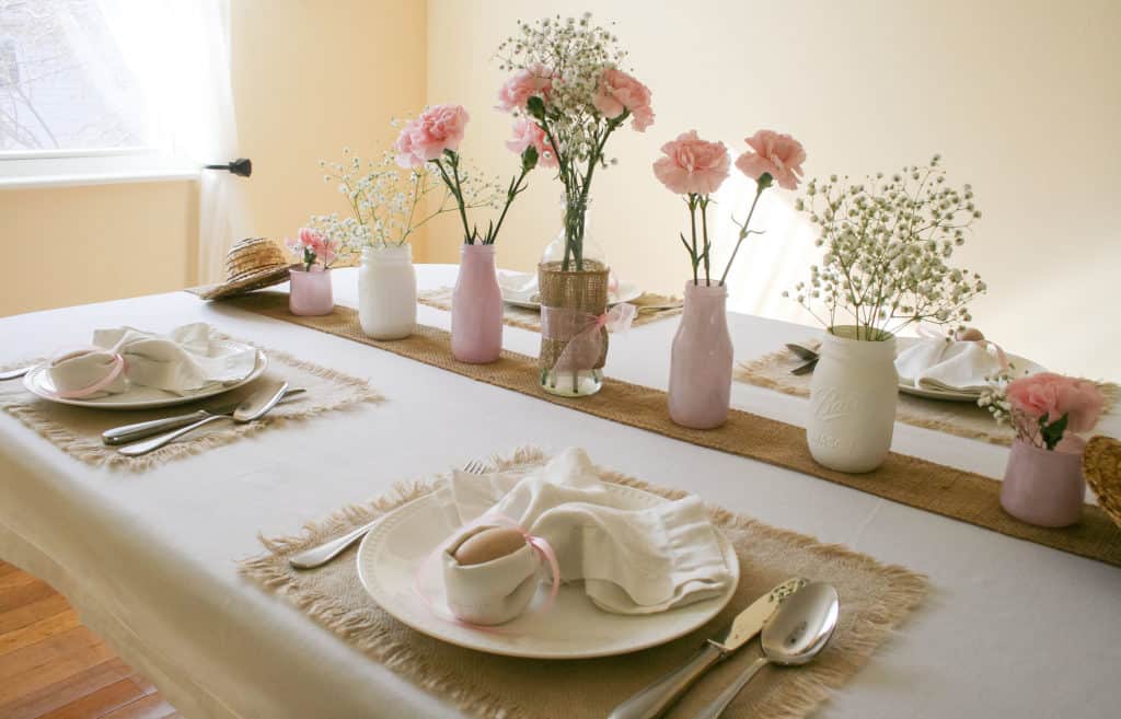 Side view of Easter tablescape with DIY vases