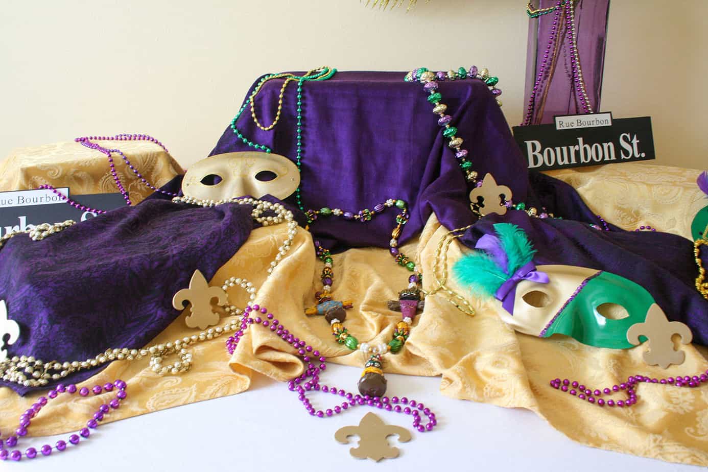 Mardi Gras Buffet Table-beads-masks-vase