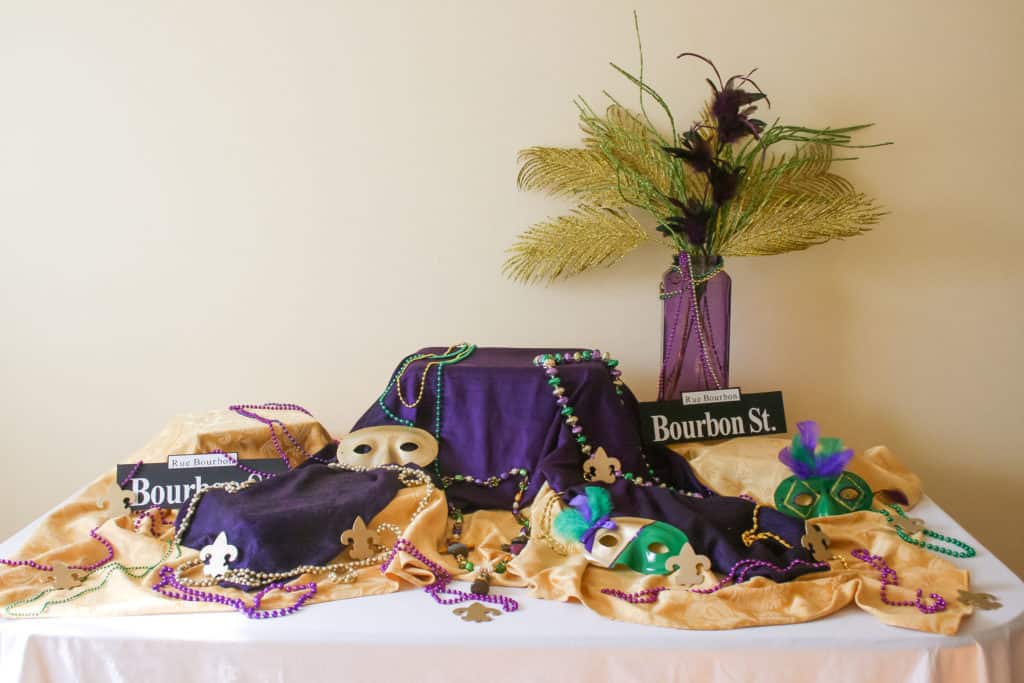Mardi Gras Buffet Table-beads-masks-vase