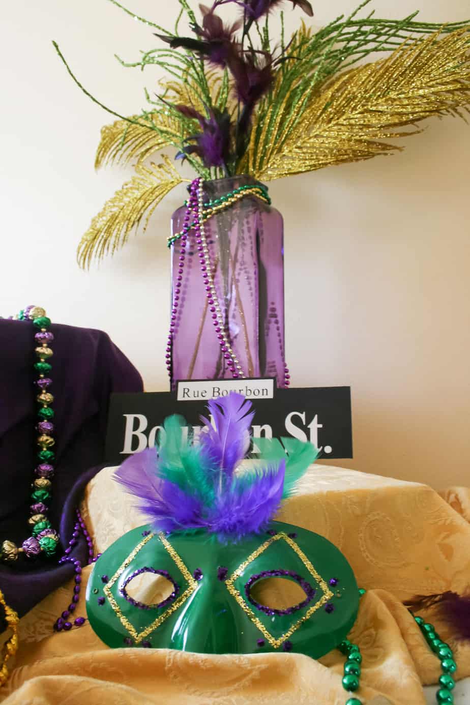 Mardi Gras mask and vase