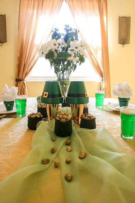 St. Patrick’s Day table setting -pots of gold and leprechaun hats