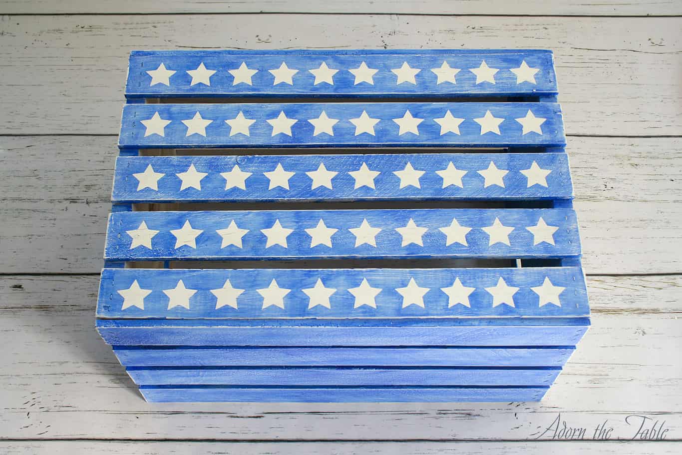 Painted craft crate to look weathered. Blue with white stars