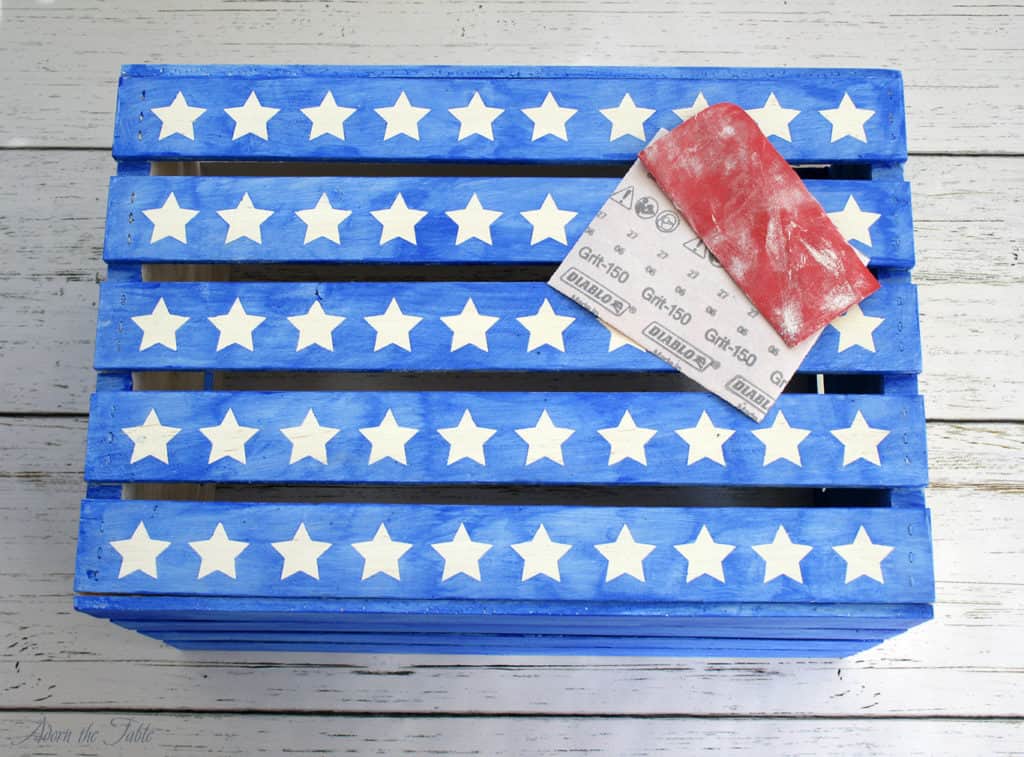 Wooden-craft-crate-with-blue-strips-stars-sandpaper
