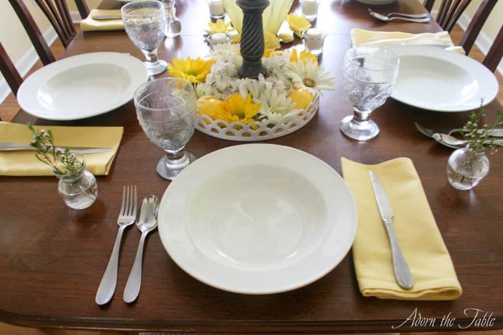 Place setting is wrong. Utensils are in the wrong places.