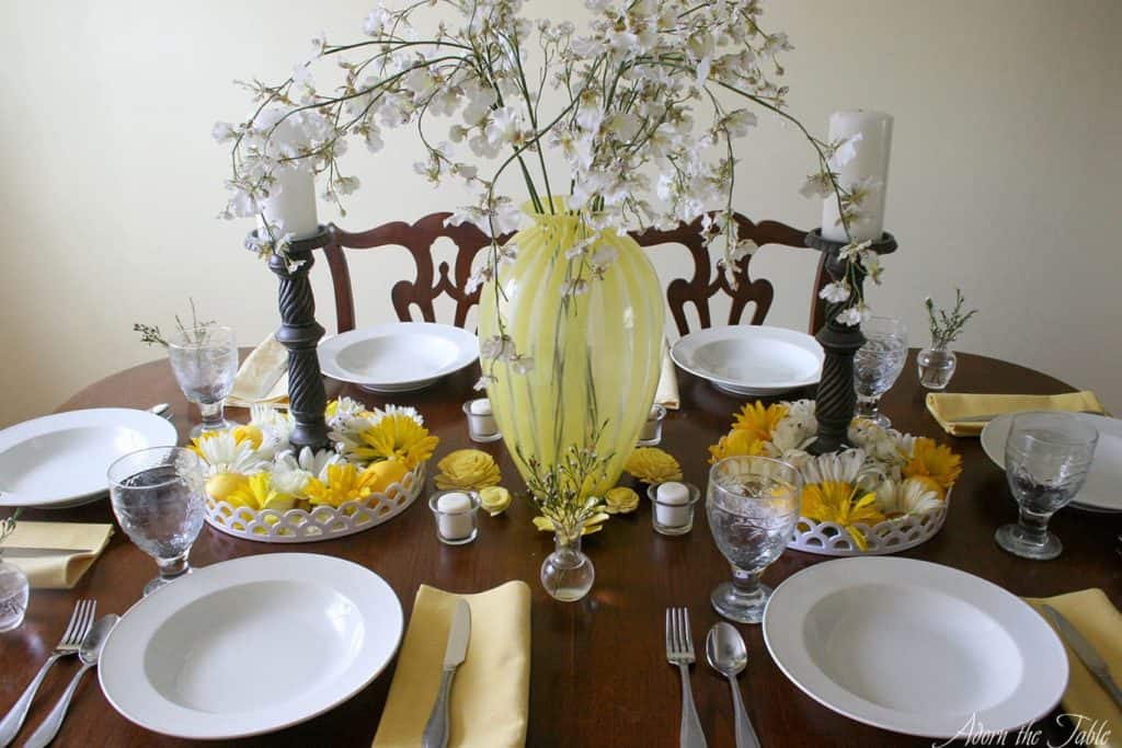 Table too crowded with yellow and white decorations