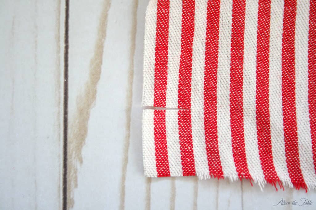 Cut in red and white stripe fabric