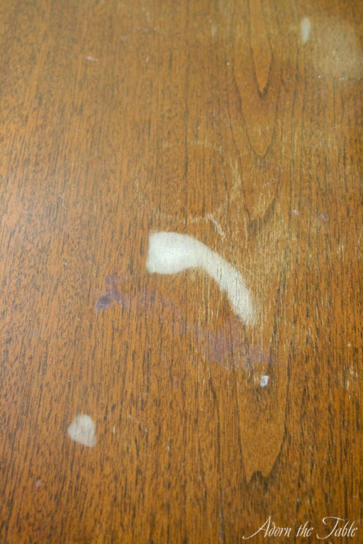 Close up of hazy white stain on old table