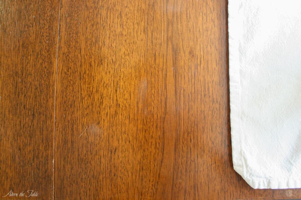 Hazy white stain on old table-after