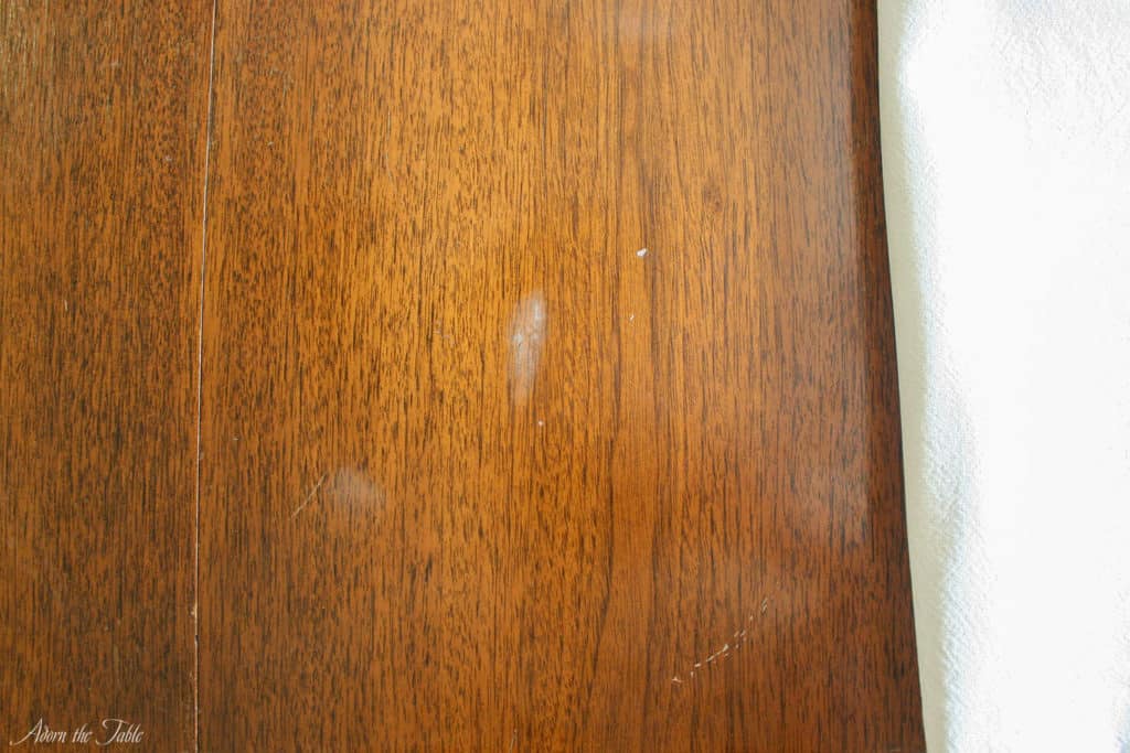 Hazy white stain on old table-after more passes