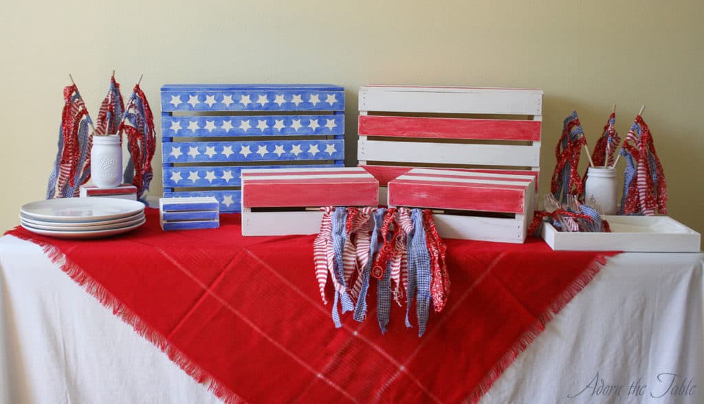 memorial day buffet table with red scarf-wooden crates and table decor