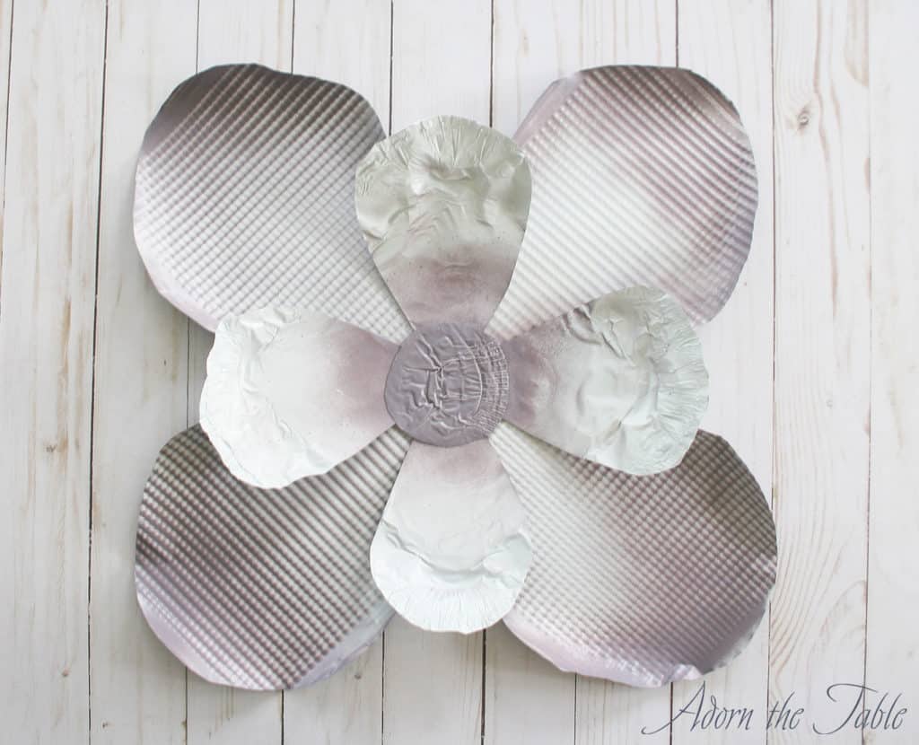 Center disc added to middle of metal cookie sheet flower