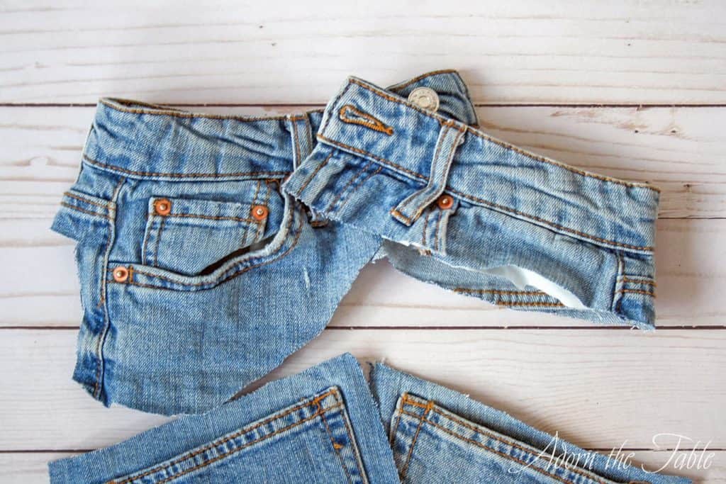 Cut waistband of denim jeans for napkin rings
