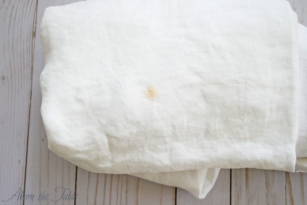 Stain on used white tablecloth