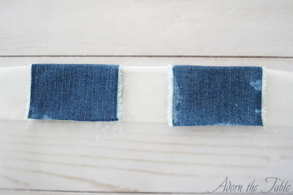 Starch covered denim place cards folded in half