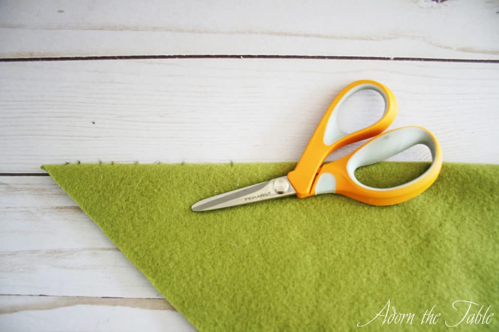 Green fleece with scissors