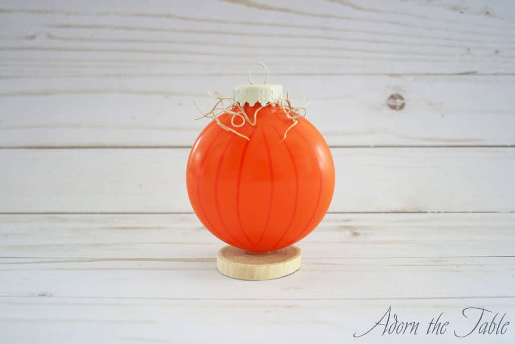 Spanish moss added to make a unique diy pumpkin place card holder