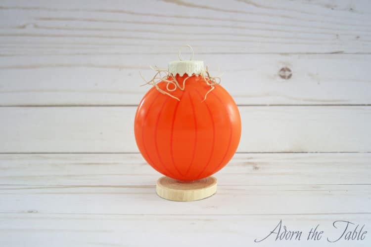 Unique DIY Pumpkin Place Card Holders Adorn the Table