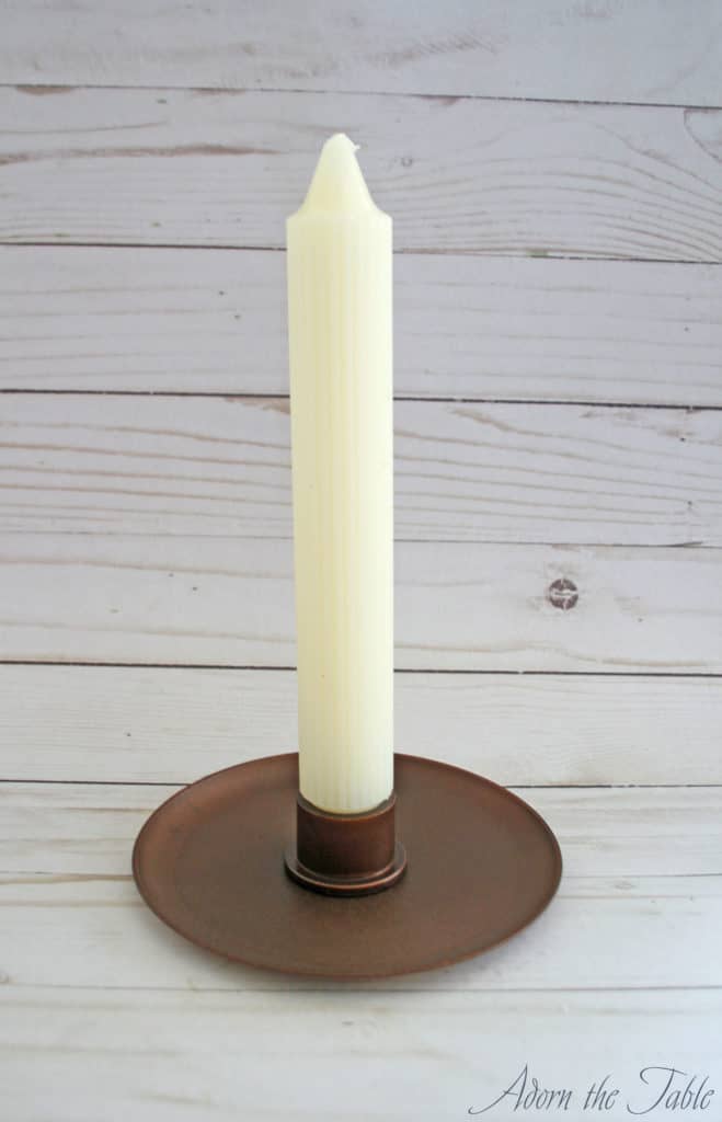 Completed DIY tall candle holder with cream candle