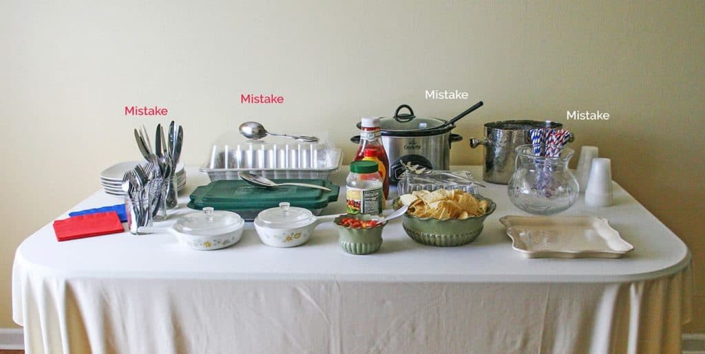9 Mistakes Setting up a buffet with all dishes on a table at one level.