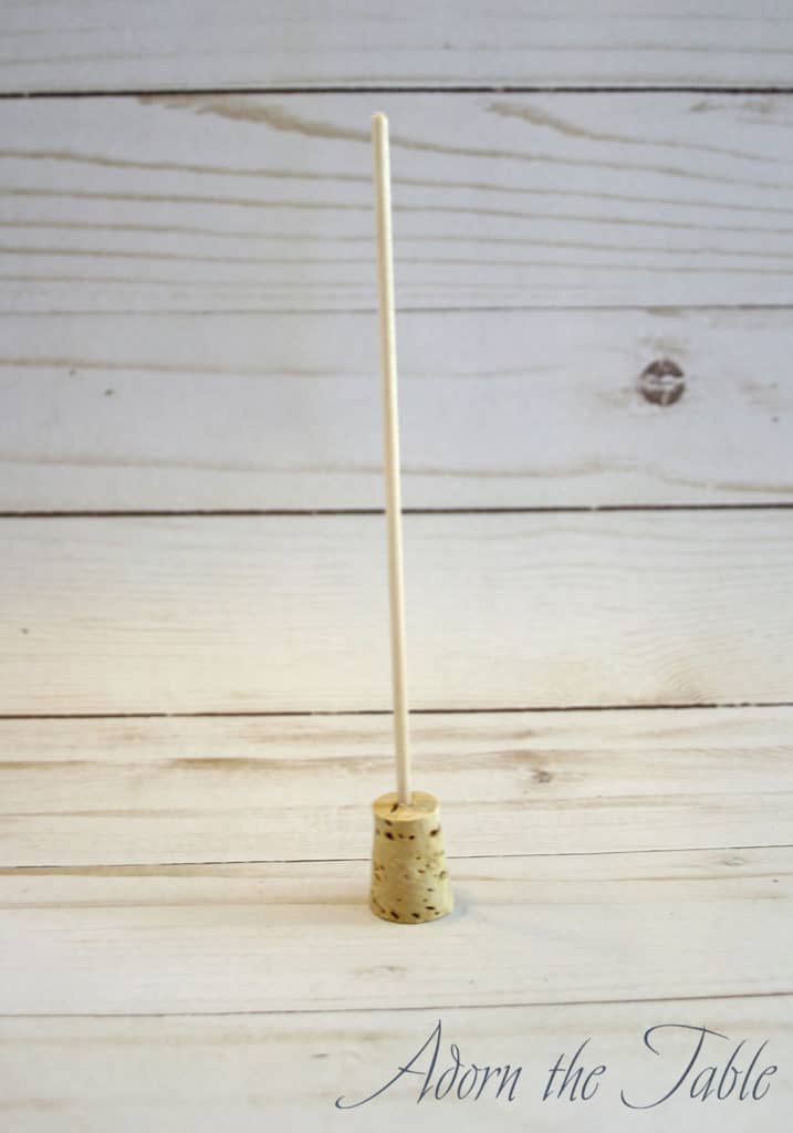 Skewer attached to cork plug for Halloween place card holder