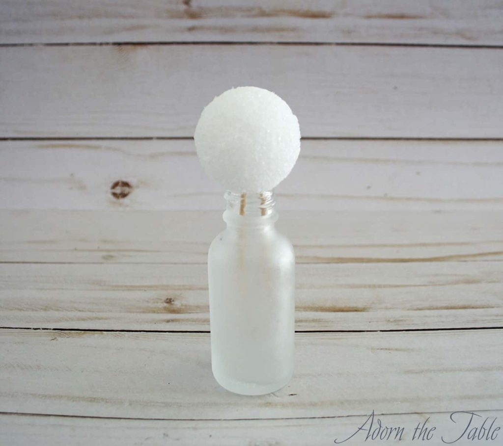 Styrofoam ball and toothpicks in small jar