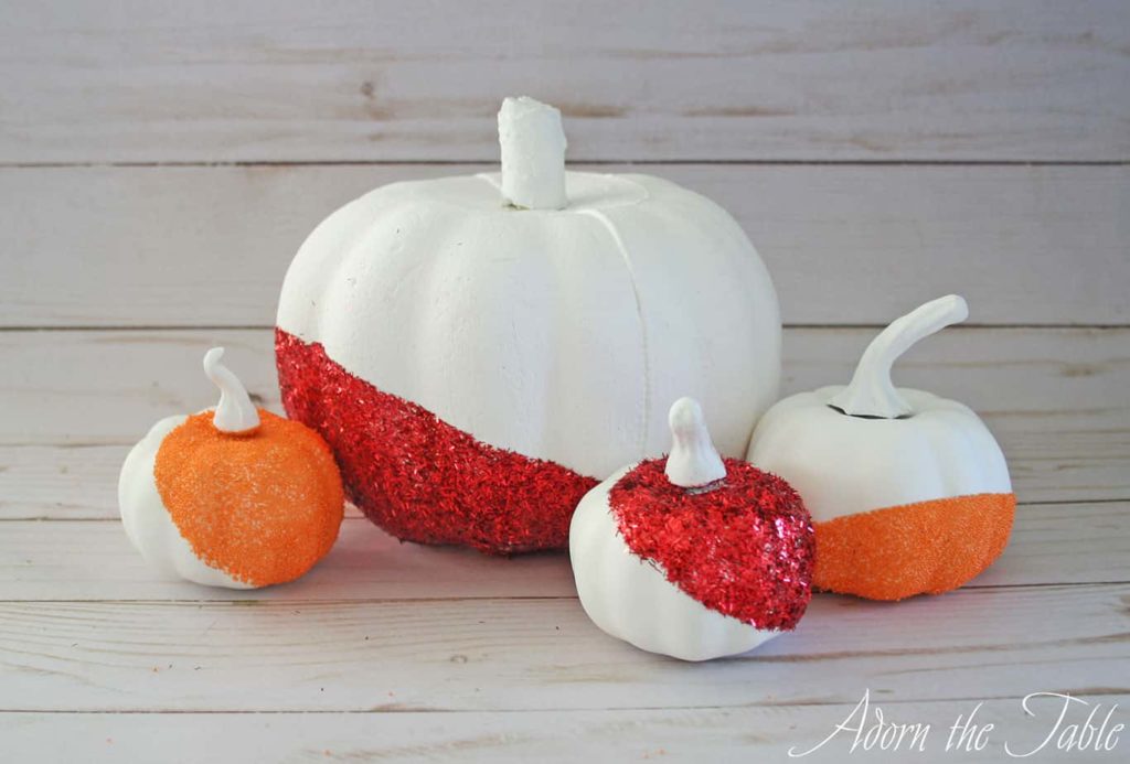 Completed modern glitter pumpkins in red and orange.
