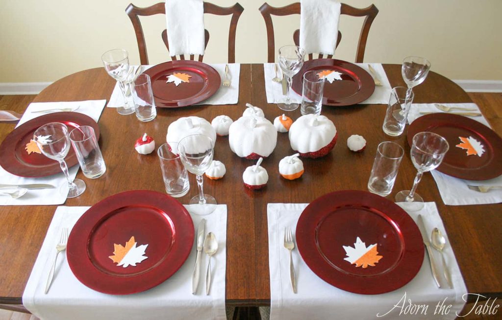 Upper angle of modern Thanksgiving Day place settings.