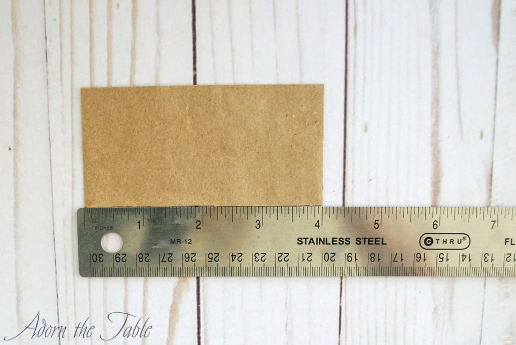 Measure paper to make diy Trick or Treat Paper Bag
