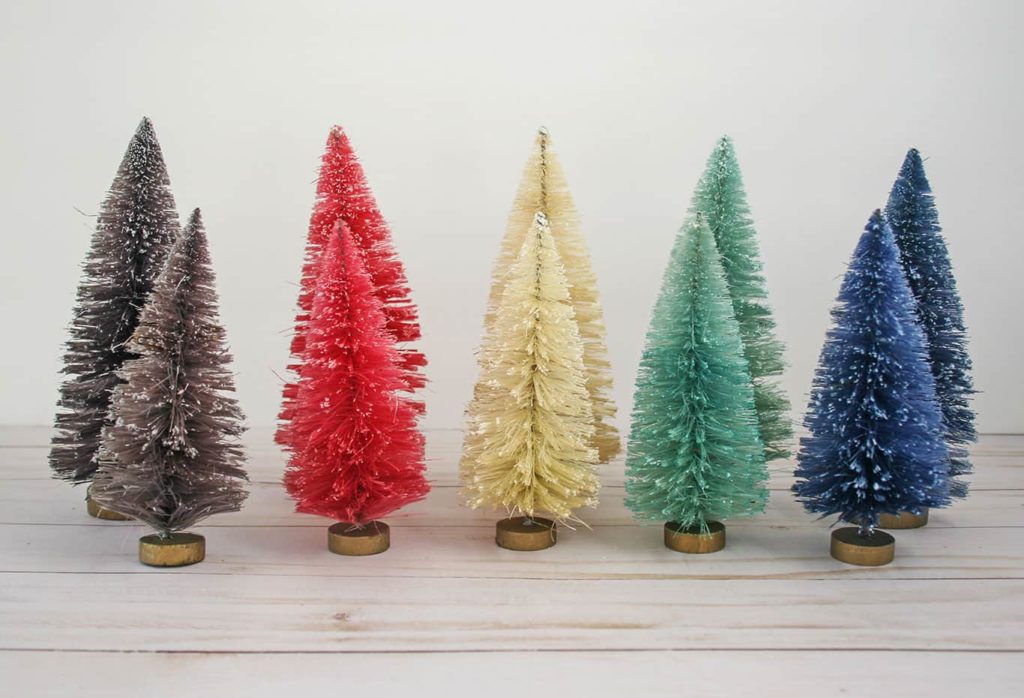 5 different colored bottle brush trees