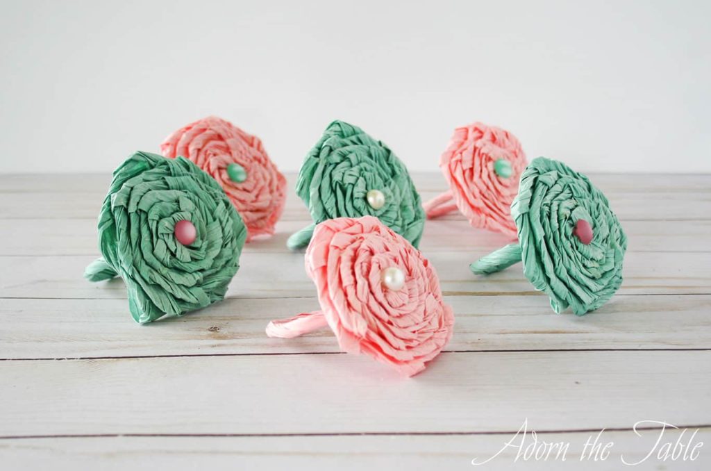 twisted paper cord flowers. 3 green ad 3 pink
