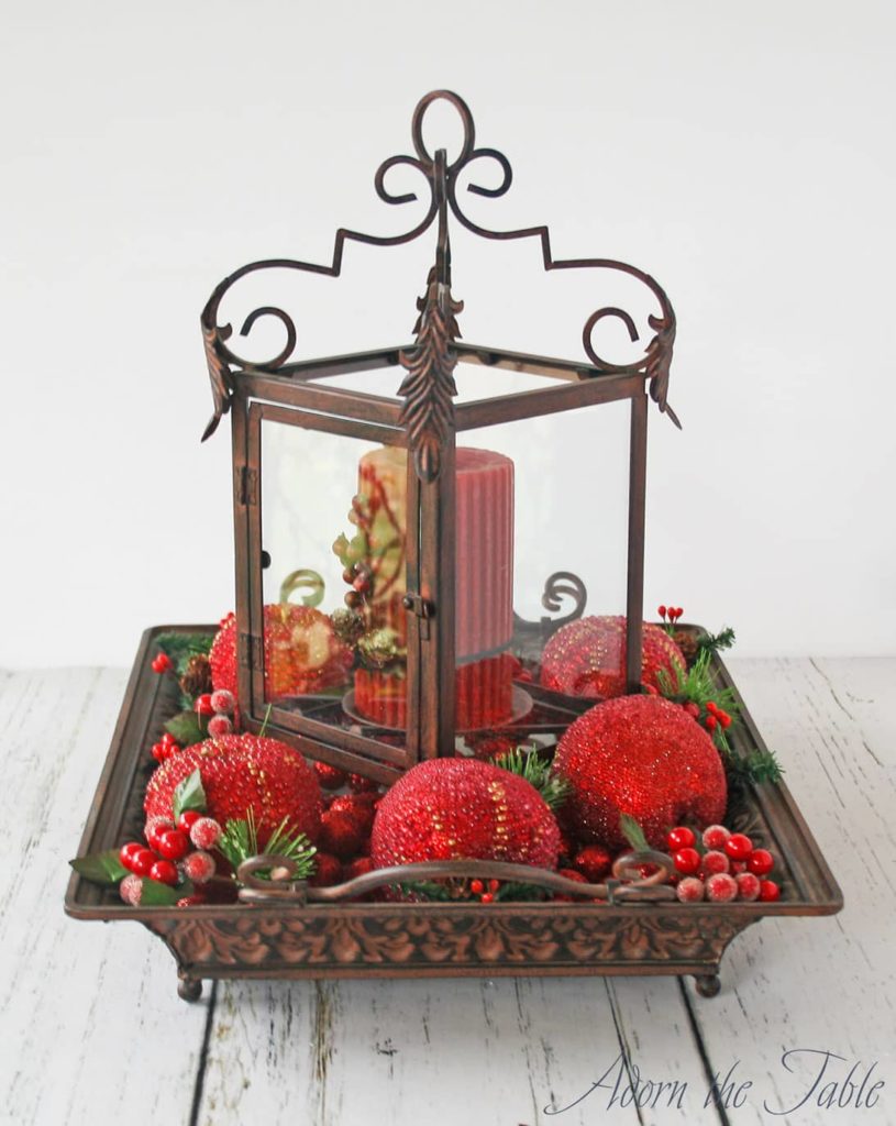 Tray with red balls and lantern