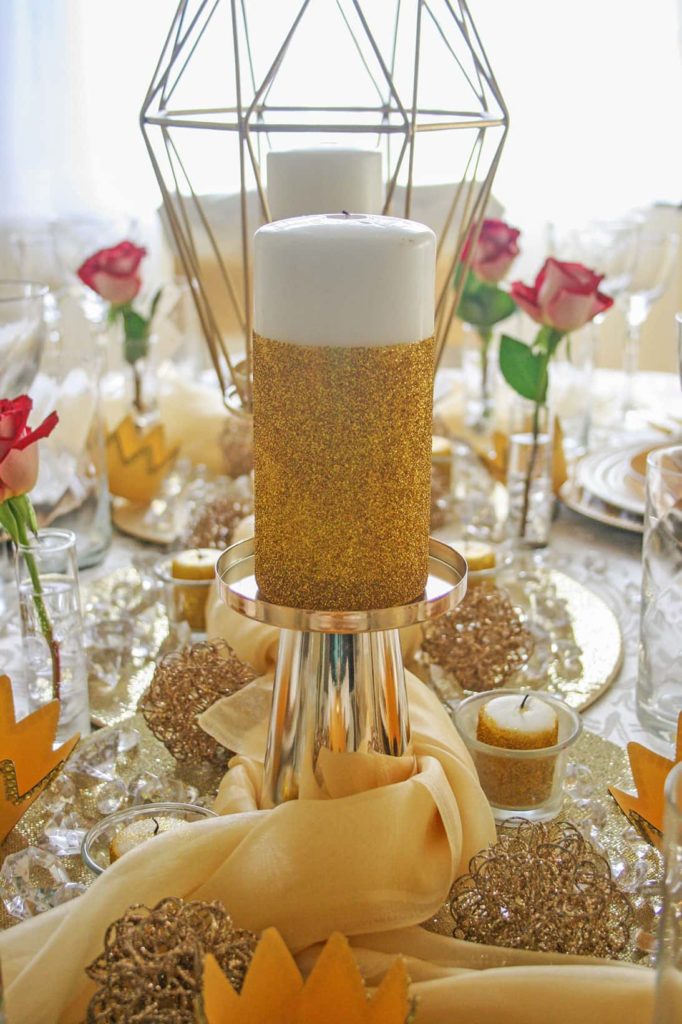 Gold glitter candle on tablescape