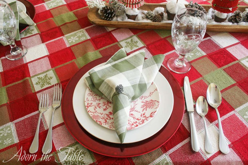 Place setting with red and white salad plate
