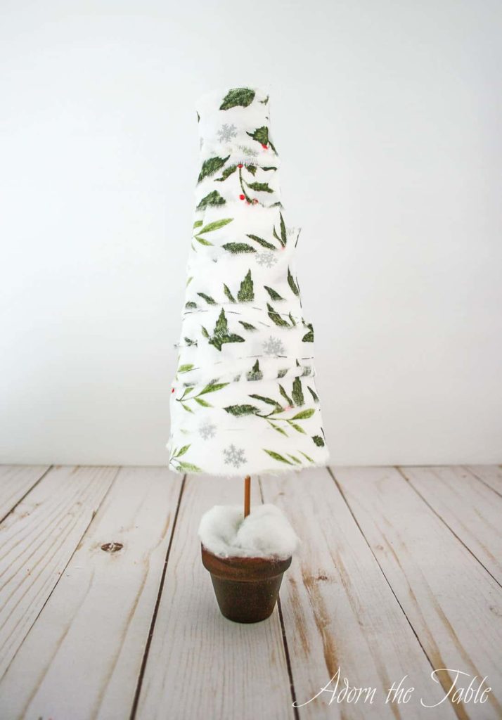 Cotton added to pot of styrofoam Christmas tree
