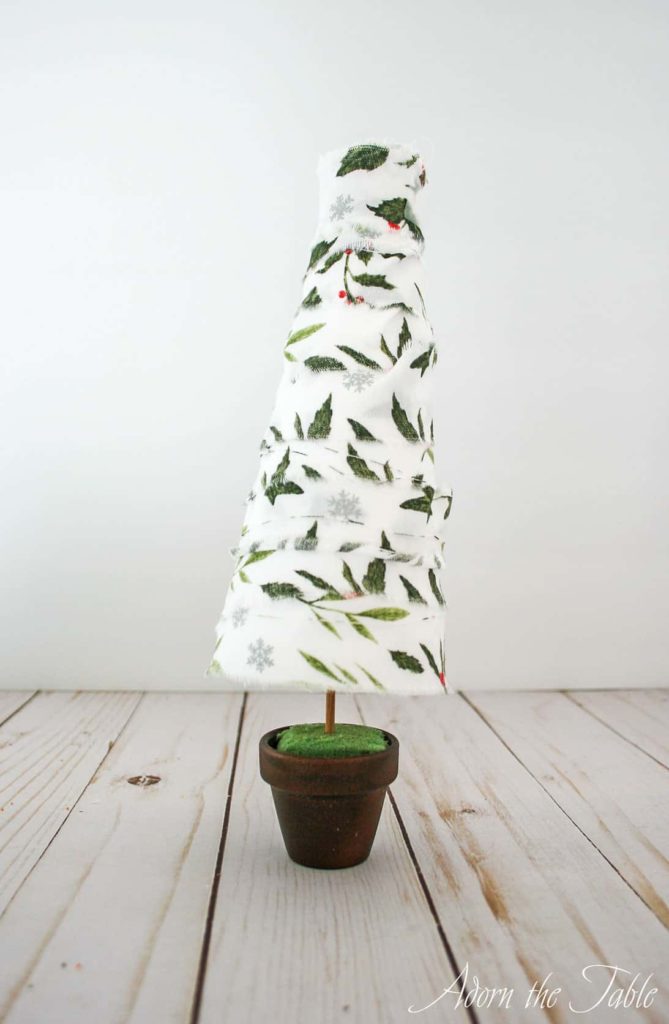 Styrofoam Christmas tree connected to clay pot