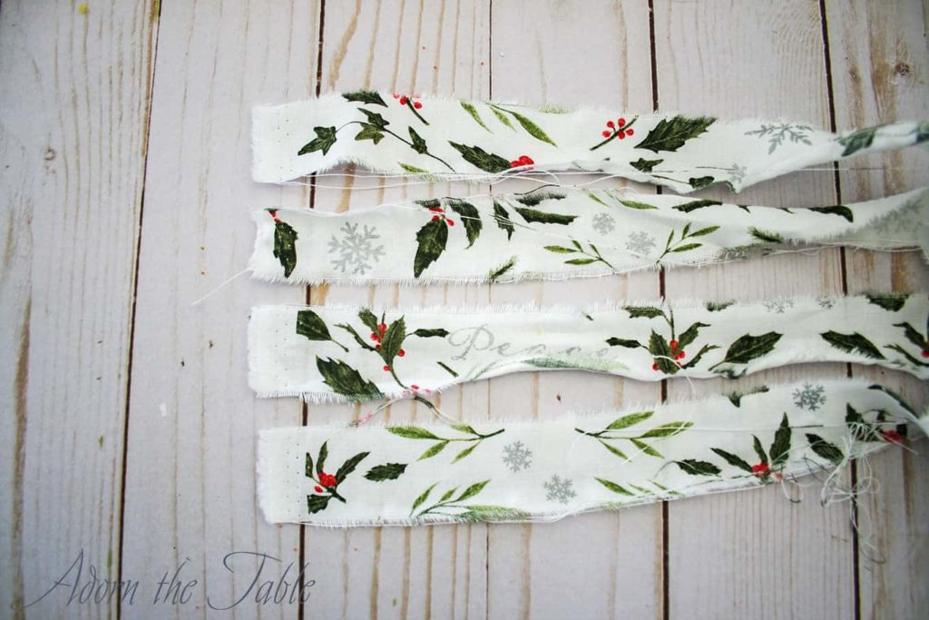 Strips of ripped fabric for diy styrofoam Christmas tree