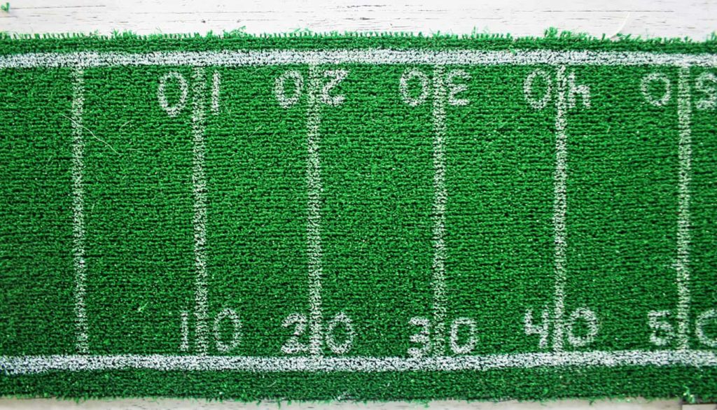 Numbers painted on diy football field table runner