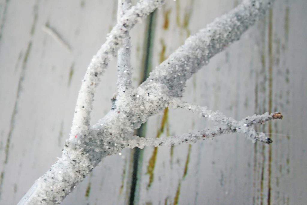 Close up of fake snow covered branch