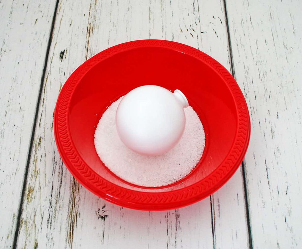White ball in fake snow mixture