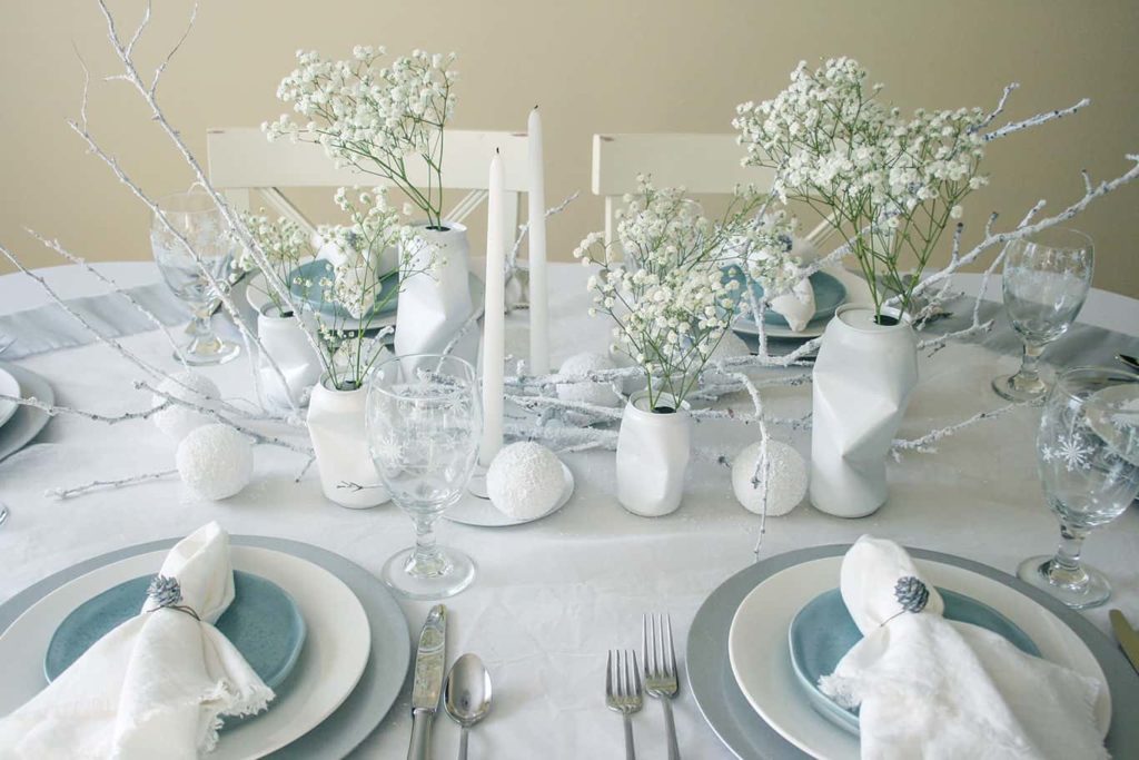 Place settings and centerpiece of tablescape