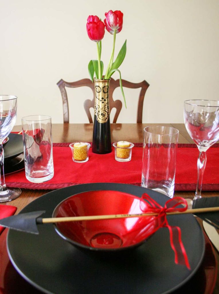 View across romantic table setting for 2