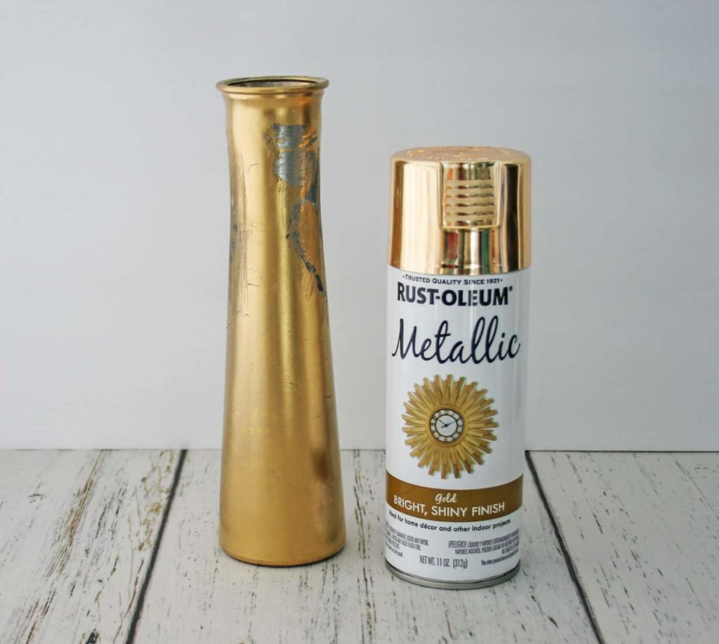Gold spray paint and vase