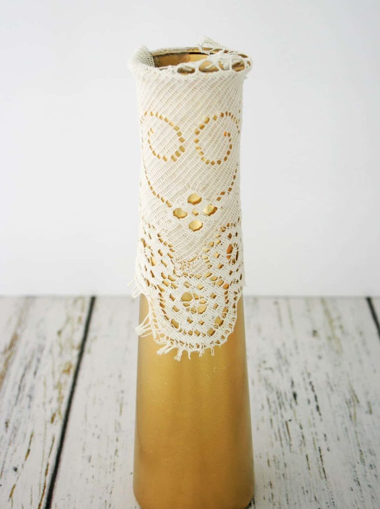 Close up of lace attached to vase
