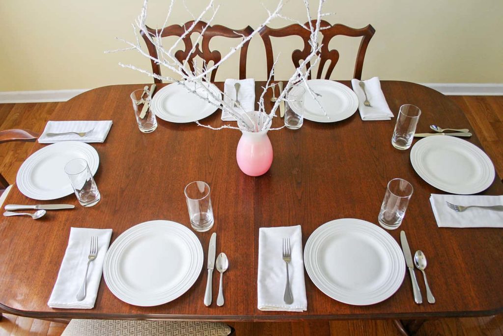 Casual table setting before transform to elegant