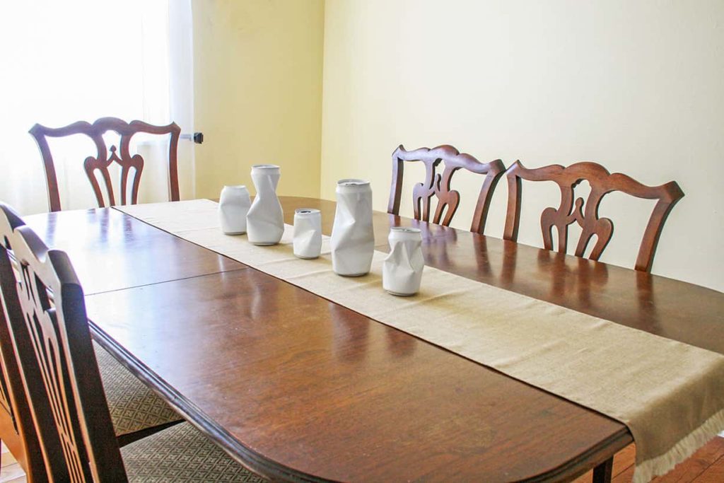 5 aluminum can vases down dining table