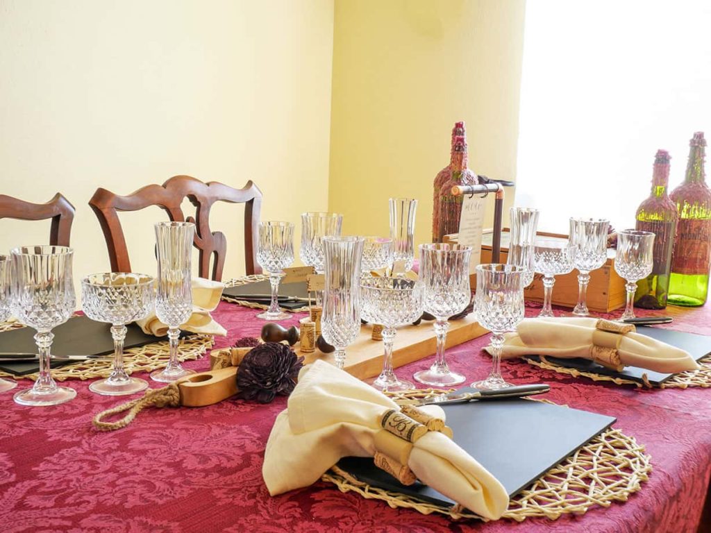 Side view of wine and cheese table setting