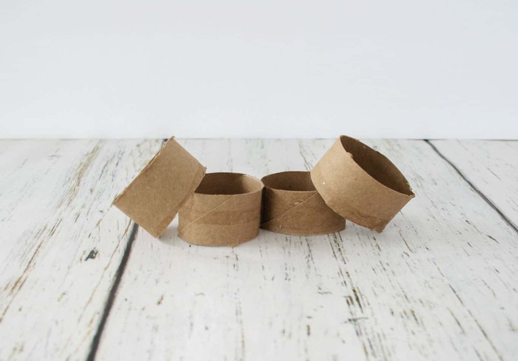 Toilet paper roll sections for wine cork napkin rings