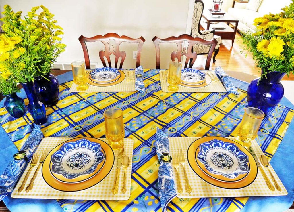 Vases on the sides of the Blue and yellow tablescape for Spring 