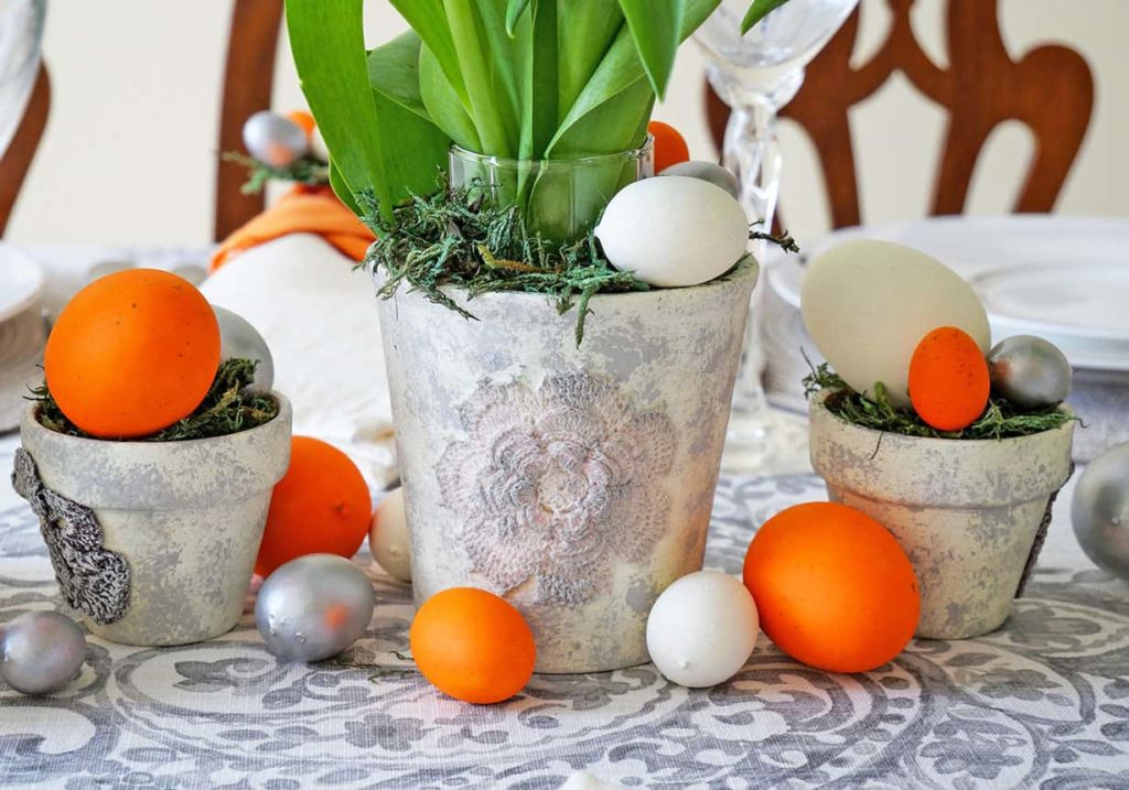 Easter eggs added to centerpiece