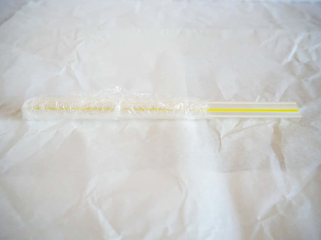 Plastic wrapped straw